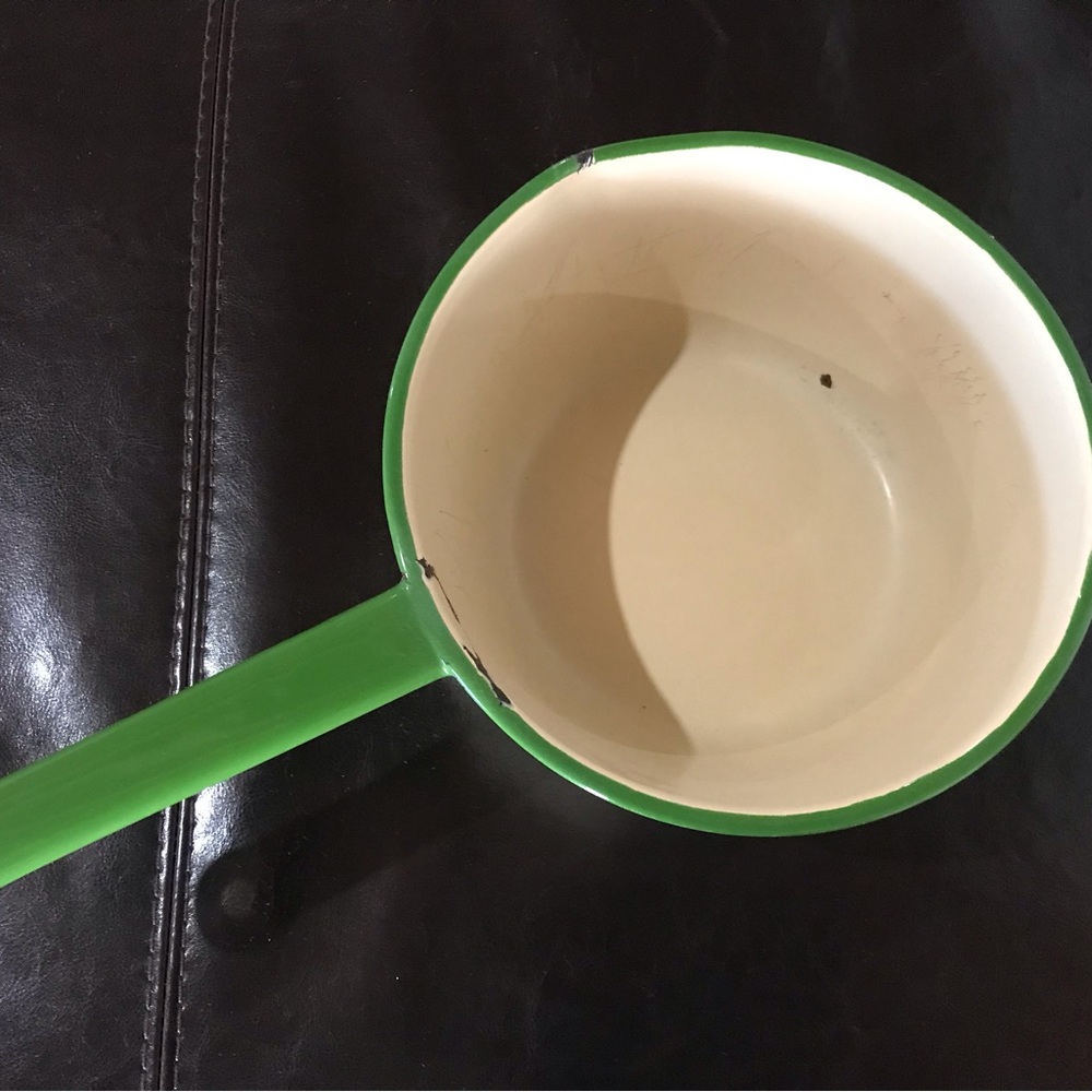 Antique Cream and Green Kettle.  Has a small tiny hole in the bottom.